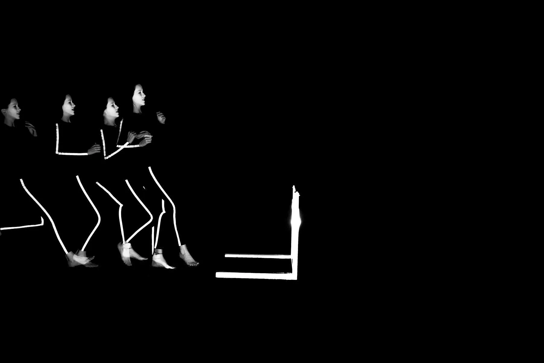 side profile of young athlete sprinting in motion sequence