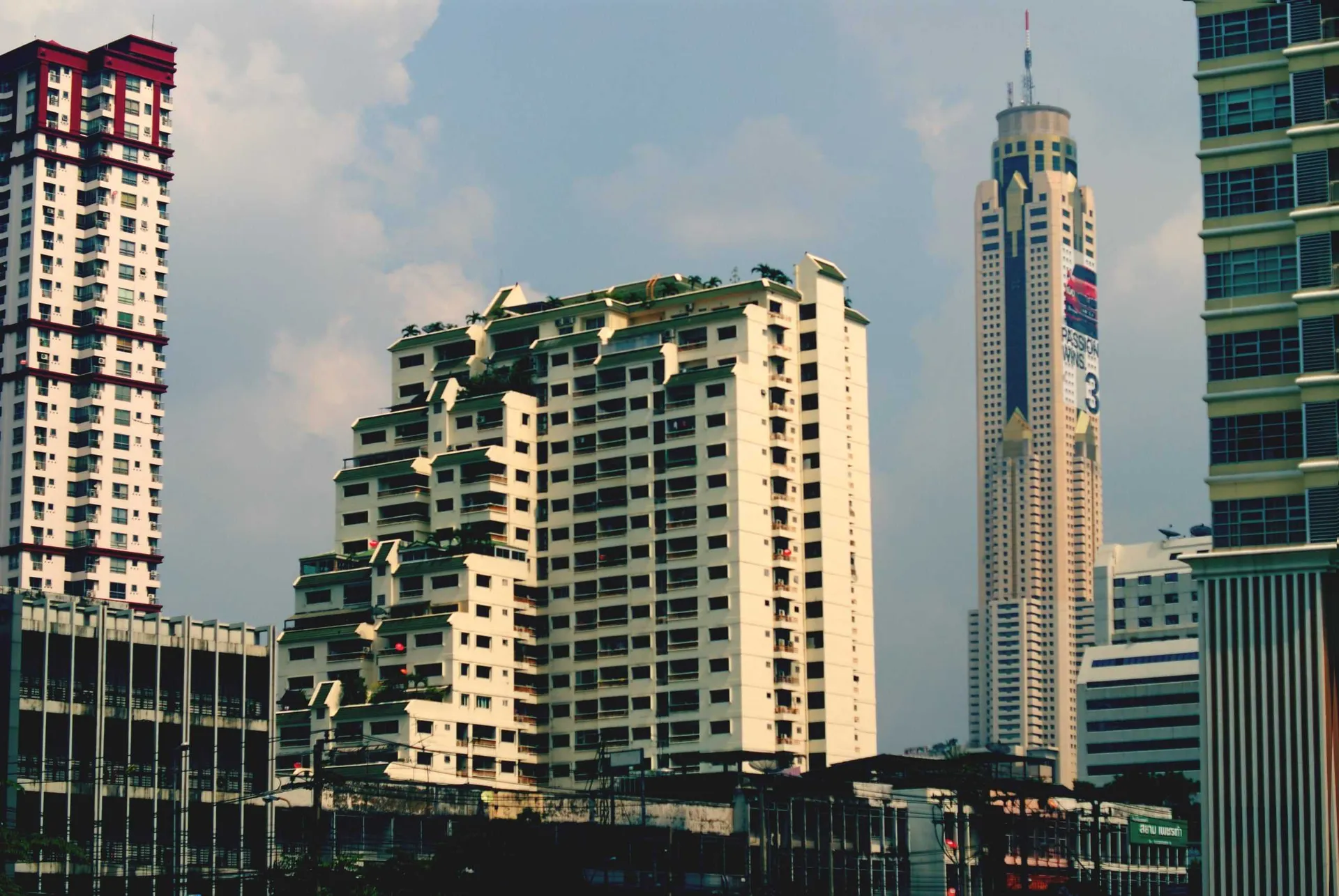 Cluster of modern high-rise residential and office buildings forming a dense urban skyline.